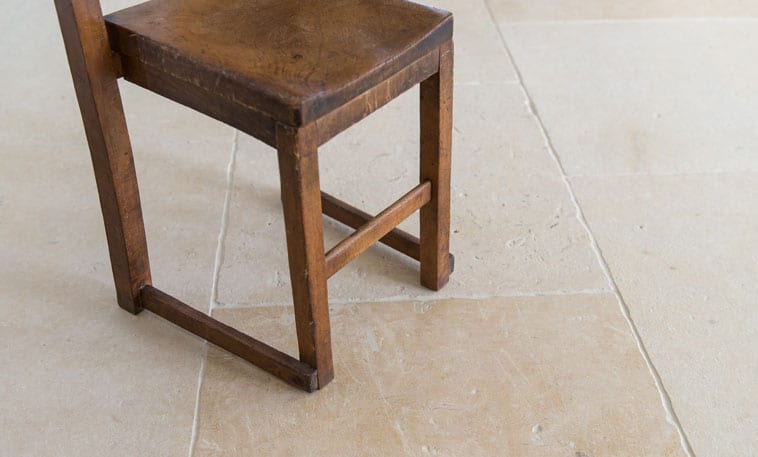 Audbourn Distressed Stone Flooring chair