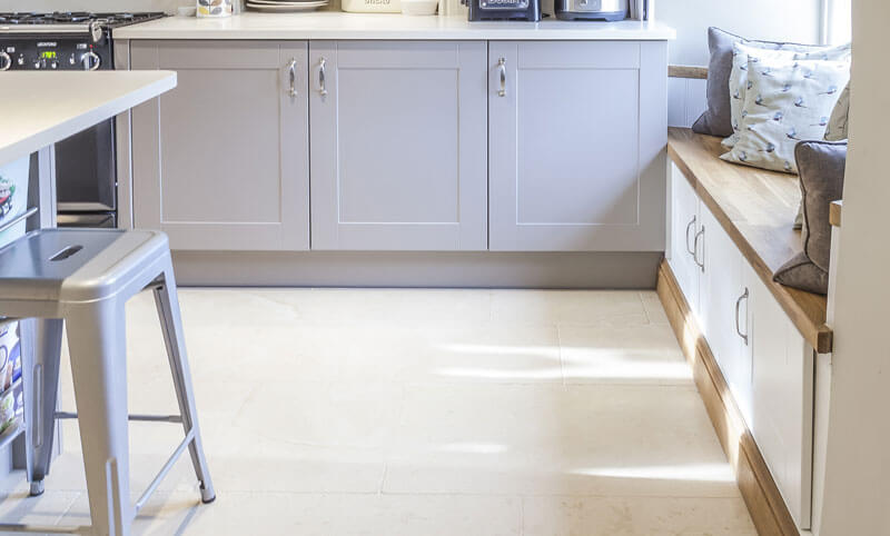 old English cream limestone flooring kitchen