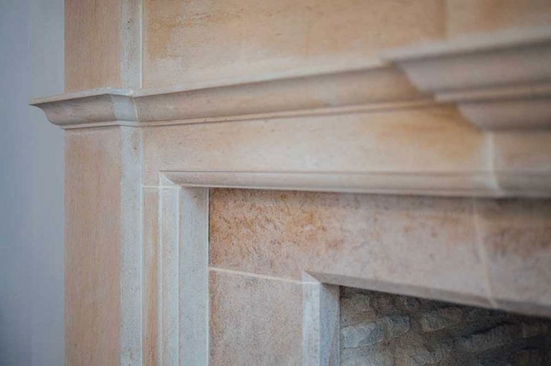 natural stone fireplace carving detail