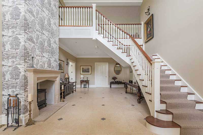 natural stone fireplace hallway