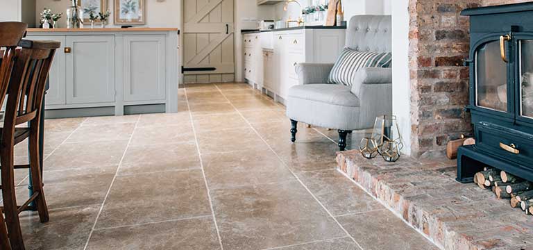 lifestyle image limestone floor tiles in kitchen