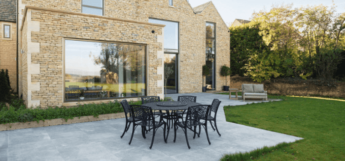 Natural stone in landscaping - from retaining walls to garden pathways