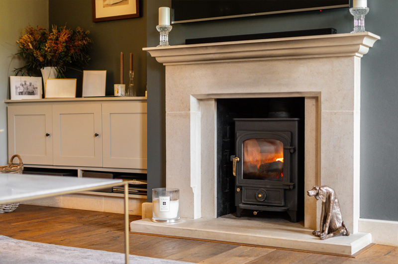 limestone fireplace beautifully styled